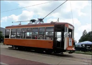  ?? Special to the Democrat-Gazette/MARCIA SCHNEDLER ?? Visitors to Fort Smith can ride on a vintage streetcar from the local trolley museum.