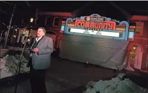  ?? Christian Abraham / Hearst Connecticu­t Media ?? Bill Harris, director of the Sacred Heart Community Theatre, speaks after the marquee was lit up in downtown Fairfield on Tuesday.