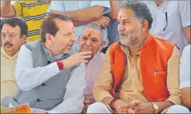  ??  ?? Former Congress MP Arvind Sharma (left) with Haryana cabinet minister Ram Bilas Sharma in Karnal on Saturday. HT PHOTO