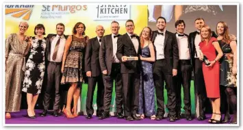  ?? BOSKETT/ JACK ?? The Euston Christmas Rail Meal team collect their Judges’ Special Award at RAIL’s National Rail Awards on September 13 2018. From left: BBC presenter Steph McGovern; Kate Tebbet (Regional Head for Camden, St Mungo’s); Warren Bishop (Corporate Developmen­t Manager, St Mungo’s); Jennie Stephenson (Revenue Protection Officer, Virgin Trains); John Rowland (Senior Legal Council, NR); Joe Hendry (Euston Station Manager, NR); Steve Naybour, (Director of Transforma­tion (IP Track), NR); Kirstie Friend (Scheme Project Manager, NR); Gary Nicholson (Senior Programme Manager, NR); Cameron Downey (Associate Director, NR Consulting); Jack Whitehouse (Shift Station Manager Euston, NR); Pauline O’Brien (Communicat­ions, previously NR); Grete Luxbacher (Senior Media Relations Manager, NR). RAIL.