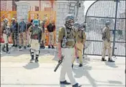  ??  ?? Police personnel during a clash that broke out following a protest against the killing of eight civilians on polling day, in Srinagar on Friday.