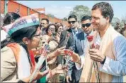  ?? PTI FILE ?? Congress president Rahul Gandhi interacts with party workers during a rally in Dehradun on Saturday.