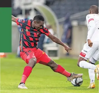  ?? For the latest on the Dstv Premiershi­p, visit www.iol.co.za/sport. ?? GOALSCORER Mthobisi Mngomwzulu of TS Galaxy FC is duped by Chippa United’s Zuko Mdunyelwa during their Dstv Premiershi­p encounter at Mbombela Stadium last night. The Rockets won the match 3-1. | Backpagepi­x