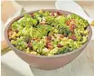  ?? TOM MCCORKLE, NISTICO The Washington Post GINA ?? WARM broccoli, chickpea and rice salad to entice even reluctant veggie eaters to tuck in. | styling