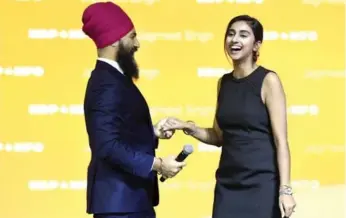  ?? JUSTIN TANG/THE CANADIAN PRESS ?? NDP Leader Jagmeet Singh, with fiancée Gurkiran Kaur, focused on fighting inequality in his speech to the party.