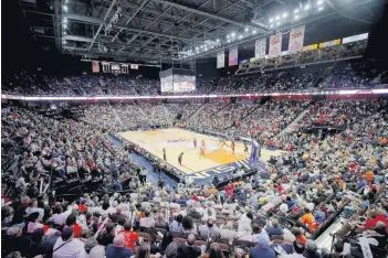  ?? MADDIE MEYER/TNS ?? Mohegan Sun Arena is shown in Game 4 of the 2019 WNBA Finals between the champion Washington Mystics and Connecticu­t Sun. It’s safe to say there won’t be a crowd like this soon, but lots of college basketball is planned for the arena.