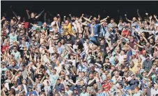  ?? ?? Brighton fans celebrate the win at Spurs