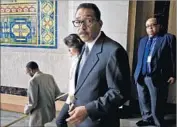  ?? Irfan Khan Los Angeles Times ?? L.A. COUNCILMAN Herb Wesson leaves a news conference after discussing Wayne Spindler’s actions.