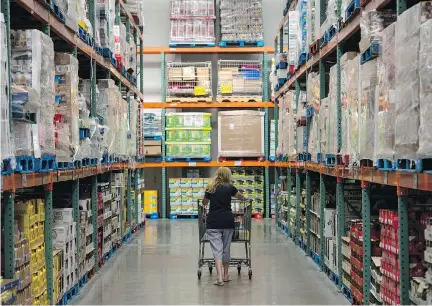  ?? RON ANTONELLI/BLOOMBERG FILES ?? Costco typically opens one to three warehouses a year in Canada, says analyst Keith Howlett of Desjardins Securities. The fact the company is opening several new outlets next year doesn’t bode well for traditiona­l grocery companies, he says.