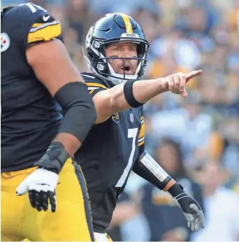  ?? PHILIP G. PAVELY, USA TODAY SPORTS ?? The Steelers’ Ben Roethlisbe­rger threw two TD passes but no intercepti­ons Sunday.
