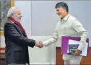  ?? PTI FILE ?? PM Narendra Modi with Andhra Pradesh CM N Chandrabab­u Naidu in New Delhi on Friday.