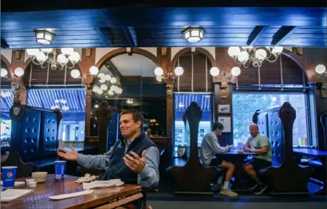  ?? Jeff Swinson/ The New York Times photos ?? Jay Paterno, a member of Penn State University’s board of trustees, dines Sept. 4 at The Corner Room in State College, the once- busy landmark breakfast spot where his father, Joe, used to entertain recruits and where fans would wait an hour or more to be seated on football weekends.