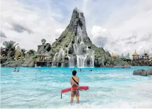  ?? JOE BURBANK/STAFF PHOTOGRAPH­ER ?? A view of the Krakatau, the volcano centerpiec­e water attraction at Universal Orlando’s Volcano Bay, during a media preview Wednesday. Volcano Bay, Universal Orlando’s newest park, opens today.