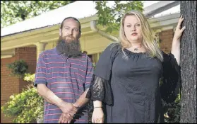  ?? HYOSUB SHIN / AJC ?? James Davis and his sister, Jessica Sims, lost ownership of their father’s home because of a “super lien” imposed by a company over property taxes and a medical bill that were unpaid.