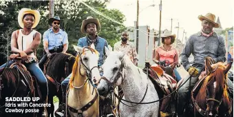  ??  ?? SADDLED UP
Idris with Concrete Cowboy posse