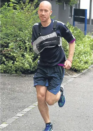  ?? sport: Athletics athlete: Derek Rae event/s: Marathon town: Kirkcaldy Picture: Dougie Nicolson. ?? Marathon runner Derek Rae, 30, has seen his time over the 26.2-mile distance improve significan­tly over the last few years. At the London Marathon he has gone from running 2.44.43 to 2.37.28 in just two years. The Kirkcaldy man, pictured right, trains...