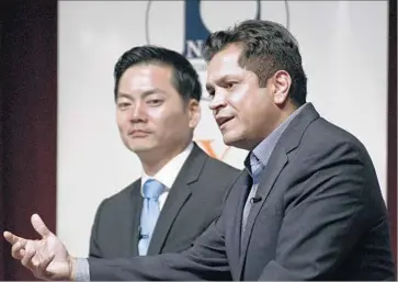  ?? Michael Owen Baker For The Times ?? SINCE MAKING the runoff, Robert Lee Ahn, left, has more or less evened the financial playing field between him and Assemblyma­n Jimmy Gomez, a three-term legislator with plenty of political connection­s.