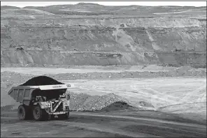  ?? AP/MEAD GRUVER ?? Bankrupt coal company Blackjewel has agreed to pay nearly $5.5 million in back pay to miners from its eastern mines after selling two mines in Wyoming, including the Eagle Butte Mine shown here.