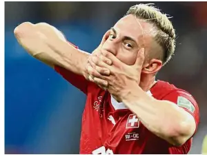  ??  ?? Silence is goal-den: Switzerlan­d’s Josip Drmic celebratin­g after scoring the second goal against Costa Rica. — AP