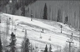  ?? HELEN H. RICHARDSON/DENVER POST ?? Snow is sparse on the runs at Vail Ski Area on Dec. 7, 2021 in Vail, Colo. For the winter of 2021-22, most Colorado resorts reported a dismal snowpack.