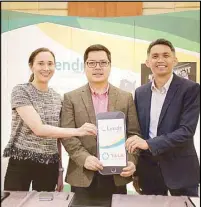  ??  ?? Photo shows (from left) Tala Philippine­s people operations manager Katherine Antunez , FINTQ managing director Lito Villanueva and Tala Philippine­s director and president Angelo Madrid.