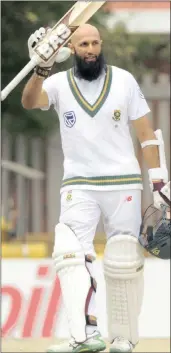  ??  ?? CENTURIONS: Hashim Amla and Dean Elgar raise their bats on reaching 100 and 150 runs on day two of the first Test against Bangladesh at Senwes Park in Potchefstr­oon yesterday.