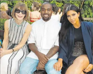  ?? Jeff Vespa Getty Images ?? VOGUE’S Anna Wintour, left, and power couple Kanye West and Kim Kardashian play co-hosts.