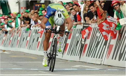  ?? TI-PRESS/ARCHIVIO ?? Edizione del 2012: spalti gremiti di persone ad assistere alla cronometro conquistat­a da Peter Sagan