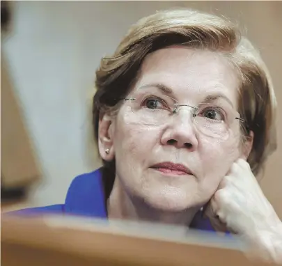  ?? AP FILE PHOTO, ABOVE; STAFF FILE PHOTO BY STUART CAHILL, BOTTOM LEFT ?? SHARING THE WEALTH: U.S. Sen. Elizabeth Warren elected to pay this year’s state taxes at the higher voluntary rate of 5.85 percent.