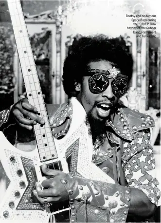  ??  ?? Bootsy and his famous Space Bass during the 1970s P-Funk heyday of the Rubber Band, Parliament and Funkadelic