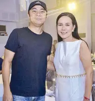  ??  ?? The birthday celebrator with Parokya ni Edgar vocalist Chito Miranda...