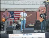  ?? CHARLES PRITCHARD — ONEIDA DAILY DISPATCH ?? The Crazy Fools perform at the Kallet Civic Center during the third annual Make’n Bacon event on Saturday, Sept. 29, 2018.