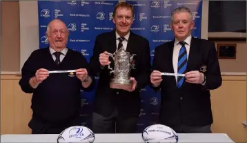  ??  ?? Padraig Connolly, left, Honorary Secretary, Skerries RFC, Andrew Owen, centre, President, Enniscorth­y RFC and representi­ng Bank of Ireland, and Robert Deacon, Senior Vice President, Leinster Branch, draw the names of Ashbourne RFC and Naas and Gorey RFC during the Towns Cup Round 3 draw at Skerries RFC.