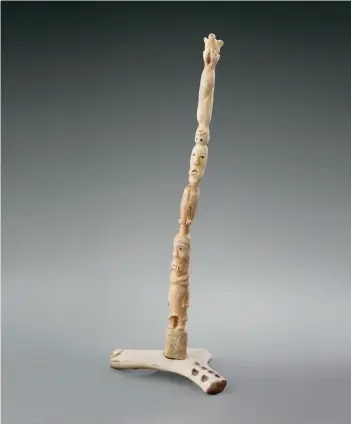  ?? COURTESY THE WALRUS FOUNDATION PHOTO MICHAEL CULLEN ?? Maudie Okittuq(b. 1944 Talurjuaq)—Arvak2017W­alrus bone and antler 57 × 15 × 15 cm