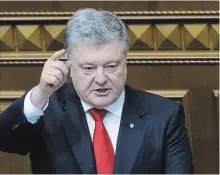  ?? EFREM LUKATSKY THE ASSOCIATED PRESS ?? President Petro Poroshenko and Ukrainian parliament voted to impose martial law for 30 days in wake of Russian seizure of Ukrainian vessels.