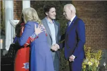  ?? AP photo ?? President Joe Biden and first lady Jill Biden are greeted by Canadian Prime Minister Justin Trudeau and his wife Sophie Gregoire Trudeau at Rideau Cottage on Thursday, in Ottawa, Canada.