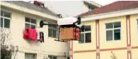  ?? AP ?? A drone takes off to deliver a JD.com parcel from Tiantong’an village near Suqian city in eastern China’s Jiangsu province. —