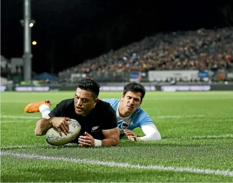  ?? GETTY IMAGES ?? Nehe MilnerSkud­der scores in the corner for the All Blacks during their win over Argentina in Nelson. It was a far from perfect performanc­e but New Zealand continued to rack up a hefty points tally.