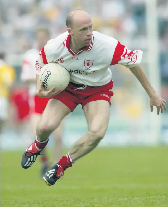  ?? INPHO ?? Incredible history: GAA star Peter Canavan in action for Tyrone in 2003