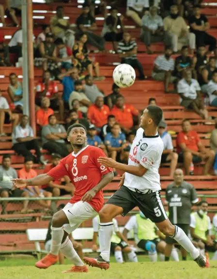  ?? Photo: Fiji FA Media ?? Suva’s central defender Remueru Tekiate (right) contests for possession against Rewa’s Setareki Hughes during the Vodafone Premier League at Ratu Cakobau Park, Nausori.