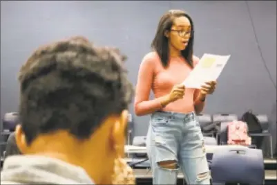  ?? Long Wharf Theatre / Contribute­d photo ?? Brianna Gilbert practices her monologue during a workshop at Cooperativ­e Arts and Humanities High School.