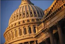  ?? THE ASSOCIATED PRESS ?? The morning sun illuminate­s the U.S. Capitol in Washington. Sen. John McCain’s opposition to the GOP’s last-ditch effort to repeal and replace the Obama health law has dealt a likely fatal blow to the legislatio­n — and perhaps to the Republican Party’s...