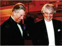  ?? COURTESY OF THE CHARLOTTE SYMPHONY PHOTO ?? Conductor Christophe­r Warren-Green with Prince Charles.