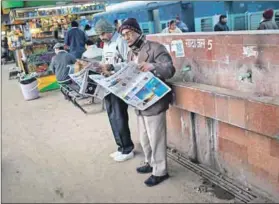  ??  ?? Old news: Media houses around the world are having to find ways of successful­ly moving their current readers into new formats of digitally imaged words and pictures. Photo: Daniel Berehulak/Getty Images