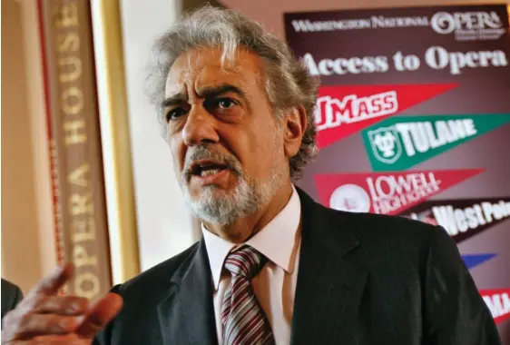  ?? (AP Photo/Jacquelyn Martin, File) ?? In this May 23, 2007, file photo, Placido Domingo, general director of the Washington National Opera, speaks during a news conference in Washington about a simulcast of a performanc­e of La Boheme. An investigat­ion into Domingo by the U.S. union representi­ng opera performers found more than two dozen people who said they were sexually harassed or witnessed inappropri­ate behavior by the superstar when he held senior management positions at Washington National Opera and Los Angeles Opera, according to people familiar with the findings.