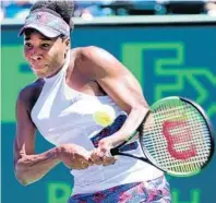  ?? CHARLES TRAINOR JR/TNS ?? Venus Williams returns a ball against Kiki Bertens during their three-set, third-round match on Sunday.