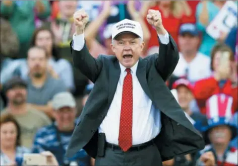  ?? ASSOCIATED PRESS ?? In this file photo, Attorney General-designate Jeff Sessions cheers on the crowd during a President-elect Donald Trump rally on Saturday, Dec. 17, 2016, in Mobile, Ala.