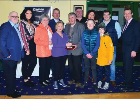  ?? Photo by www.deniswalsh­photograph­y.com ?? Teresa Holohan (K.G.O.B.A secretary) presents the Hall of Fame trophy to Johnny Kelly, Lohercanno­n ,Tralee, with his wife Nora at the awards night sponsored by K.G.O.B.A and the KGS Supporters Club at the Kingdom Stadium on Friday. From left are Murt Murphy, KGSSC chairman, Meave Kelly, Nora Kelly, Brendan Maunsell, KGOBA chairman, Teresa Holohan, Johnny Kelly, George Kelly, Liz Kelly Regan, Seán Regan, Dominic Regan, Michael Lane and KGS manager Declan Dowling.