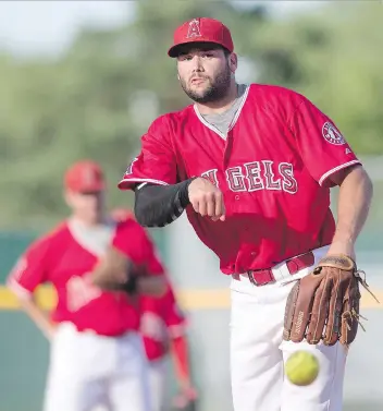  ?? LIAM RICHARDS ?? Angels pitcher/outfielder Patrick Burns pitches against the Ochapowace Chetty’s Pretty Boys during the Softball Saskatchew­an Senior A men’s provincial­s at Bob Van Impe field in Saskatoon on Friday.