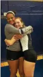  ?? COURTESY TEAGAN OCHAYA ?? Teagan Ochaya, left, and Jen Durra hug each other after a match this past season. The close friends have given their verbal commitment­s to play volleyball at Akron.